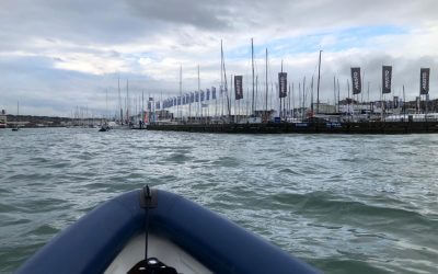 What happens on shore during Cowes Week?